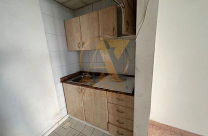 Shop - Studio for rent in Building Z04 - England Cluster - International City - Dubai