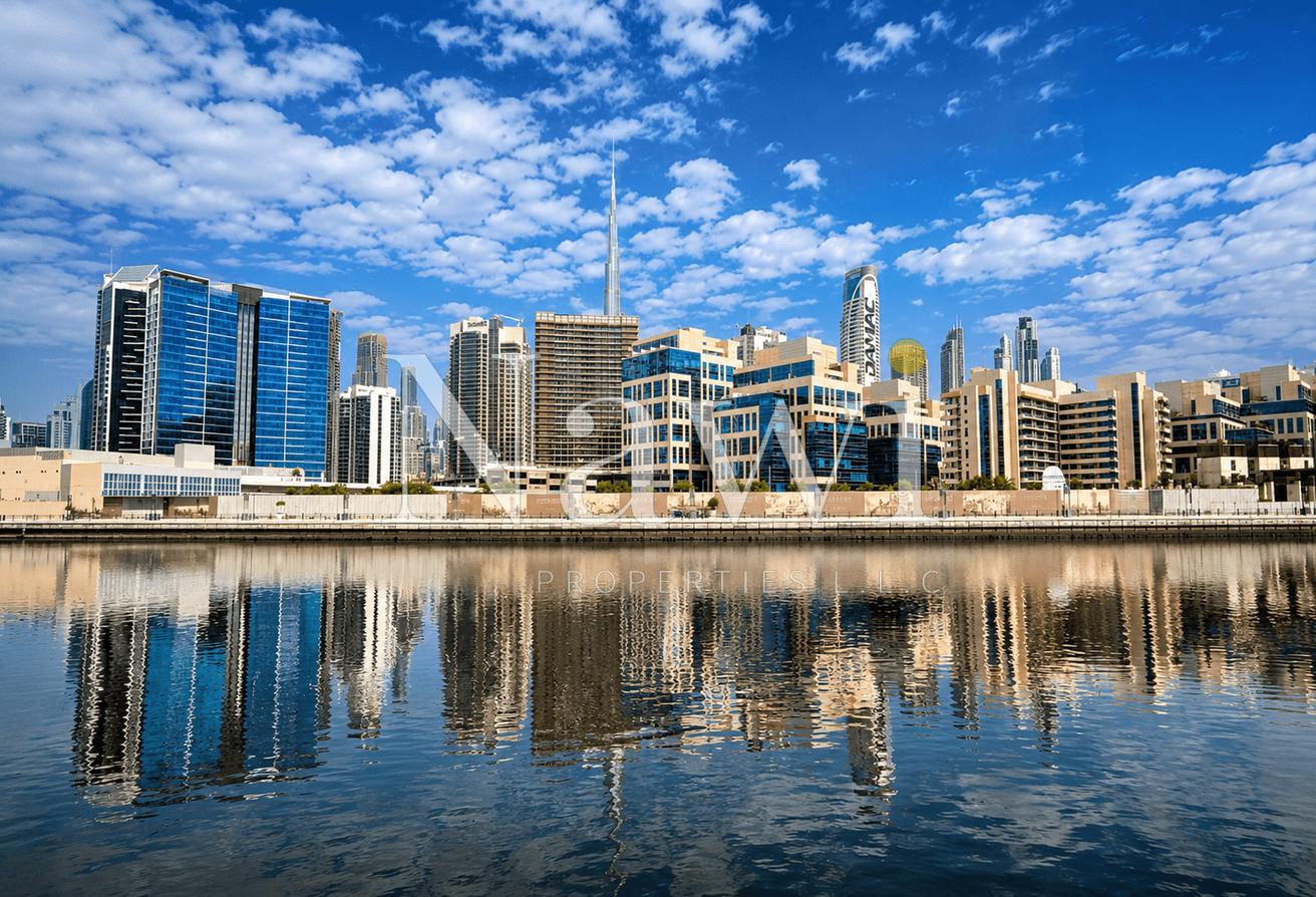 Spacious 3BR + Maid | Burj Khalifa & Canal Views photo 27