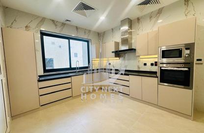 Villa - 5 Bedrooms - 7 Bathrooms for rent in Warsan Village - International City - Dubai