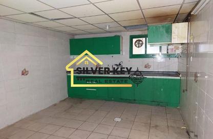 Apartment - 1 Bedroom - 2 Bathrooms for rent in Abu Shagara building - Abu shagara - Sharjah