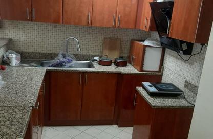 Apartment - 1 Bedroom - 2 Bathrooms for rent in Building IC1-EMR-22 - Emirates Cluster - International City - Dubai