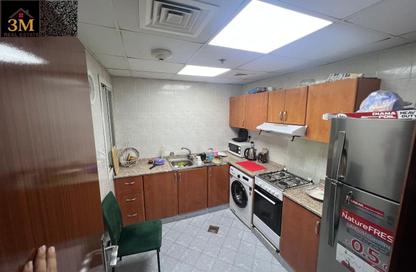 Apartment - 1 Bedroom - 2 Bathrooms for sale in Orient Tower 1 - Orient Towers - Al Bustan - Ajman
