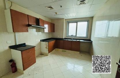 Apartment - 2 Bedrooms - 2 Bathrooms for sale in Corniche Tower - Ajman Corniche Road - Ajman