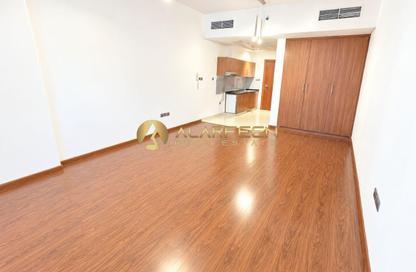 Apartment - Studio - 1 for rent in National Bonds Residence - District 15 - Jumeirah Village Circle - Dubai