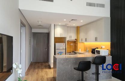 Apartment - 1 - 2 for rent in The V Tower - Dubai Land Residence Complex - Dubai