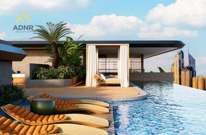 Apartment - 1 - 2 for sale in Izel by Zoya - Dubai Land Residence Complex - Dubai