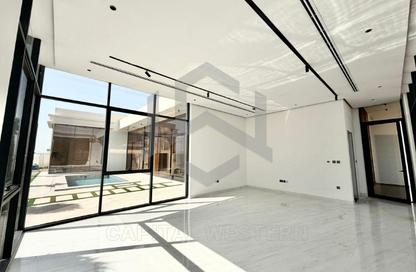 Villa - 4 Bedrooms - 5 Bathrooms for rent in Wadi Alshabak - Dubai