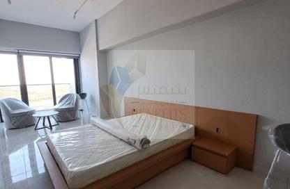 Apartment - Studio - 1 for rent in Blue Waves Tower - Dubai Land Residence Complex - Dubai