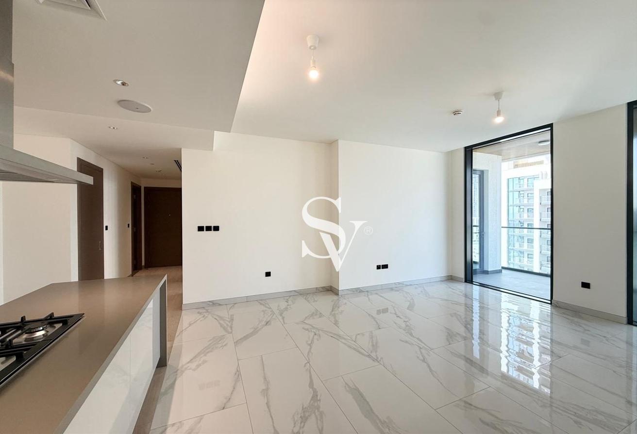 Spacious 2-Bedroom + Maid’s Room | Prime Location photo 2