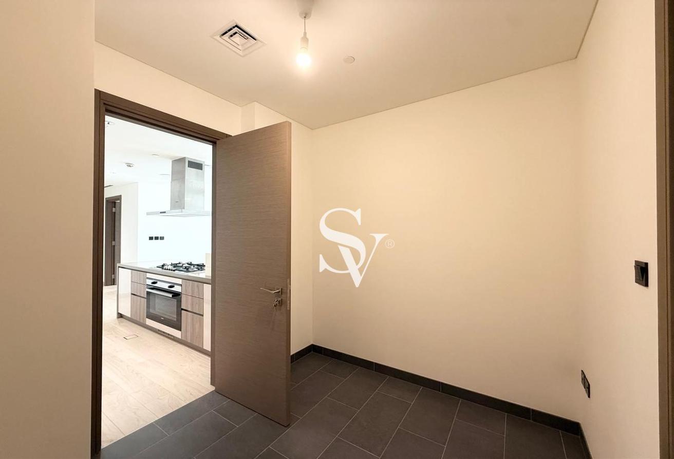 Spacious 2-Bedroom + Maid’s Room | Prime Location photo 6