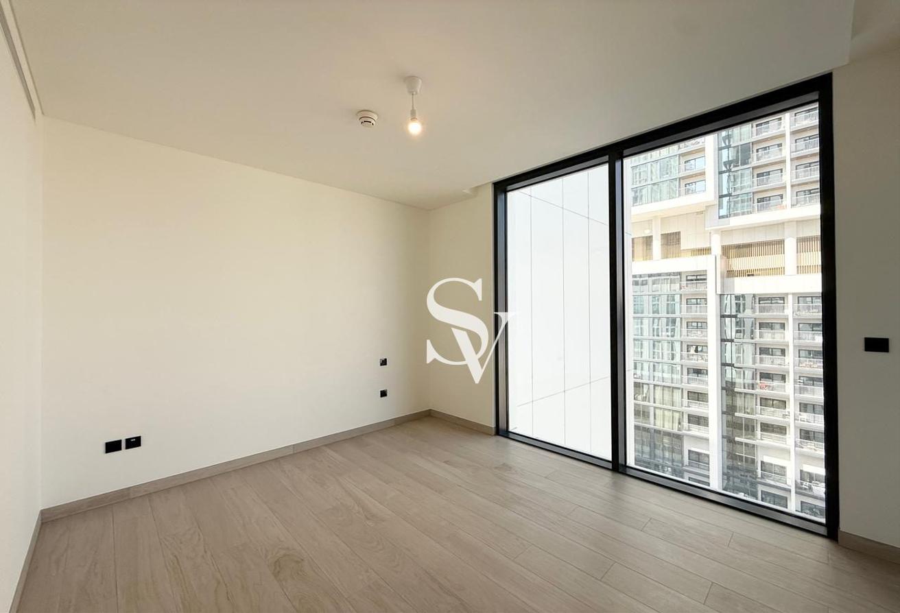 Spacious 2-Bedroom + Maid’s Room | Prime Location photo 10