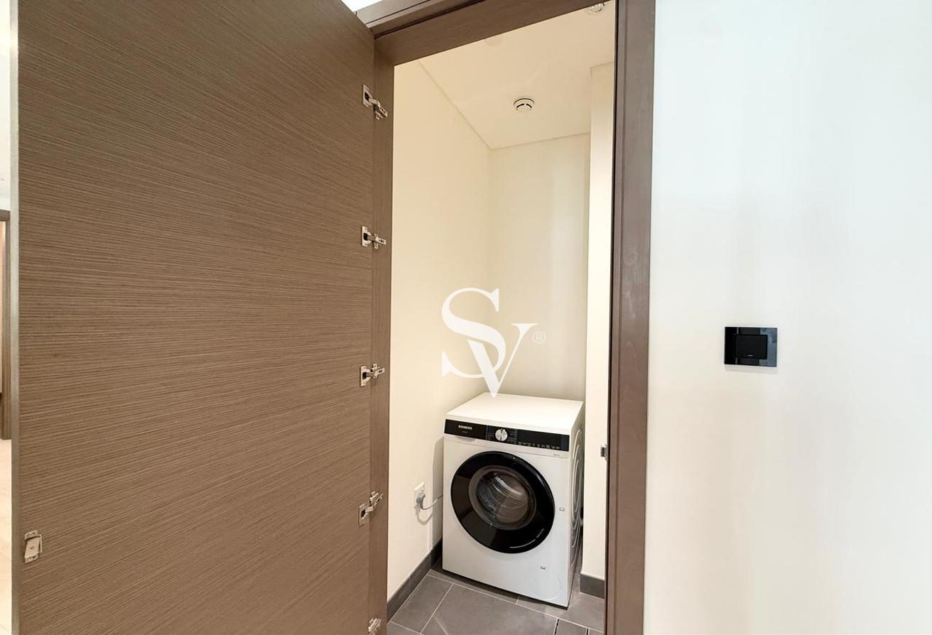 Spacious 2-Bedroom + Maid’s Room | Prime Location photo 9