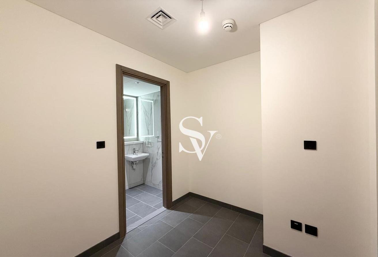 Spacious 2-Bedroom + Maid’s Room | Prime Location photo 7