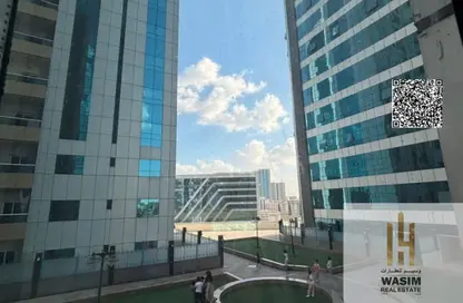 Apartment - 2 Bedrooms - 2 Bathrooms for sale in Orient Tower 2 - Orient Towers - Al Bustan - Ajman