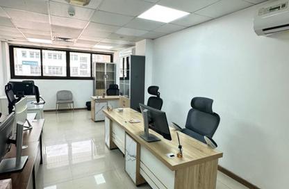 Business Centre - Studio - 2 Bathrooms for rent in Al Kazim Building - Karama Park Area - Al Karama - Dubai