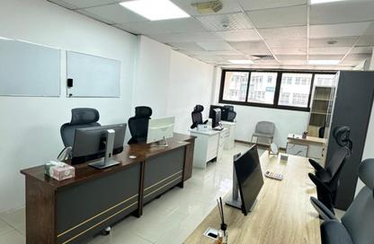 Business Centre - Studio - 2 Bathrooms for rent in Al Kazim Building - Karama Park Area - Al Karama - Dubai