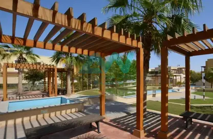 Villa - 5 Bedrooms - 7 Bathrooms for sale in Golf Gardens - Khalifa City - Abu Dhabi