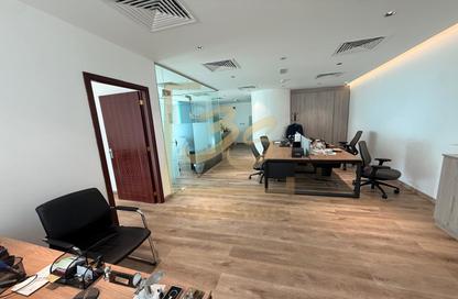 Office Space - Studio - 2 Bathrooms for sale in The Prism - Business Bay - Dubai