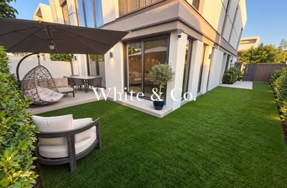 Townhouse - 4 - 5 for rent in Aura Gardens - Tilal Al Ghaf - Dubai
