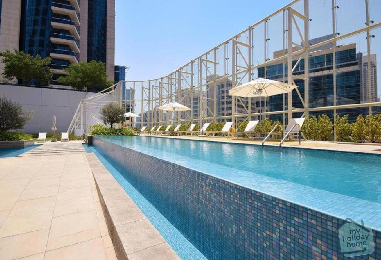 Elégant Canal View 1BR | Pool & Gym | Business Bay photo 15