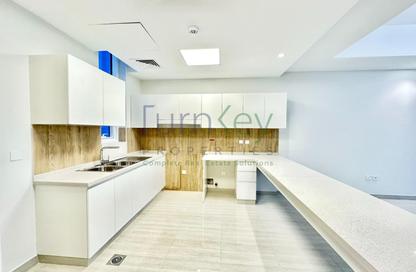 Townhouse - 4 - 5 for rent in Intima Villas - Victory Heights - Dubai Sports City - Dubai