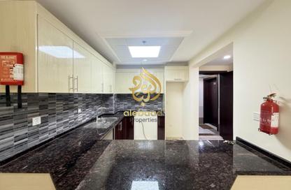 Apartment - 1 - 2 for rent in Nuaimi Residence - Dubai Land Residence Complex - Dubai
