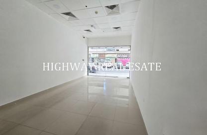 Shop - Studio - 1 Bathroom for rent in Al Nada Tower - Al Nahda - Sharjah