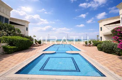 Villa - 4 Bedrooms - 5 Bathrooms for rent in Jumeirah 1 Villas - Jumeirah 1 - Jumeirah - Dubai