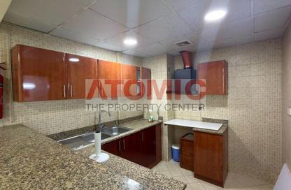 شقة - غرفة نوم - 2 حمامات للايجار في اي سي 1 اماراتي 11 - طراز إماراتي - المدينة العالمية - دبي شقة - غرفة نوم - 2 حمامات للايجار في اي سي 1 اماراتي 11 - طراز إماراتي - المدينة العالمية - دبي