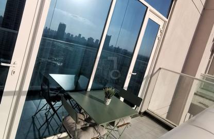 Apartment - 1 Bedroom - 2 Bathrooms for sale in Miraclz Tower by Danube - Arjan - Dubai