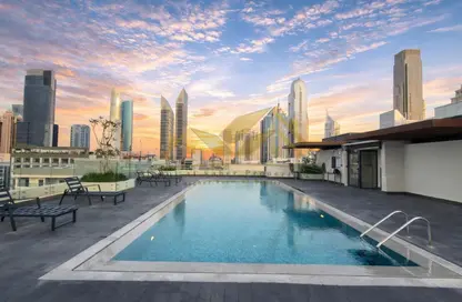 Apartment - 1 Bedroom - 2 Bathrooms for rent in Jumeirah Garden City - Al Satwa - Dubai