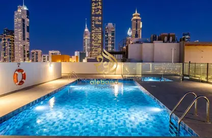 Apartment - 1 Bathroom for rent in Ayhaco 7 - Jumeirah Garden City - Al Satwa - Dubai