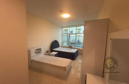 شقة - 2 غرف نوم - 2 حمامات للبيع في أورينت تاور 1 - أورينت تاور - البستان - عجمان