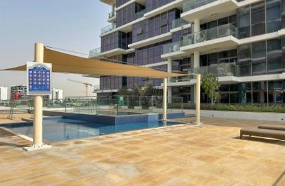 Apartment - 1 - 2 for sale in Golf Promenade 3B - Golf Promenade 3 - Golf Town - Damac Hills - Dubai