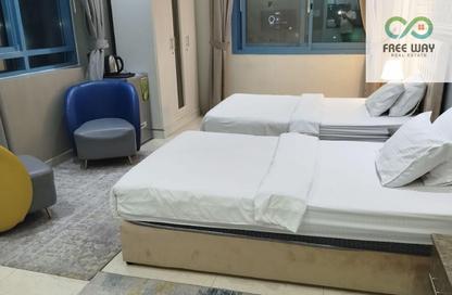 Apartment - Studio - 1 for rent in Corniche Tower - Ajman Corniche Road - Ajman