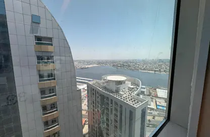 شقة - غرفة نوم - 2 حمامات للايجار في أورينت تاور 1 - أورينت تاور - البستان - عجمان