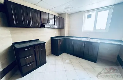 شقة - 2 غرف نوم - 2 حمامات للايجار في مجمع مويلح - تجارية مويلح - الشارقة