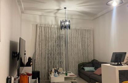 Apartment - 1 - 2 for sale in Smart Tower 1 - Al Amerah - Ajman