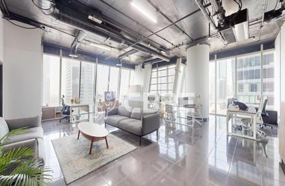 Office Space - Studio - 2 Bathrooms for rent in The Prism - Business Bay - Dubai