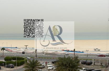 Apartment - 1 Bedroom - 2 Bathrooms for rent in Corniche Tower - Ajman Corniche Road - Ajman