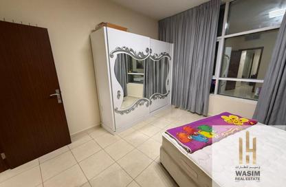 Apartment - 1 - 2 for sale in Orient Towers - Al Bustan - Ajman
