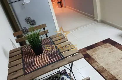 Apartment - 1 Bathroom for rent in Silicon Gates 3 - Silicon Gates - Dubai Silicon Oasis - Dubai