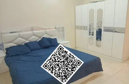 شقة - غرفة نوم - 2 حمامات للايجار في أورينت تاور 1 - أورينت تاور - البستان - عجمان