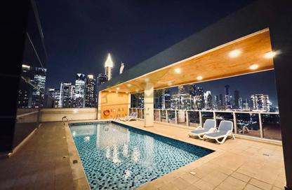 Apartment - 1 Bedroom - 2 Bathrooms for rent in Jumeirah Garden City - Al Satwa - Dubai