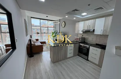 Apartment - 1 Bedroom - 2 Bathrooms for rent in Chaimaa Premiere - District 15 - Jumeirah Village Circle - Dubai