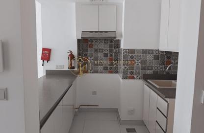 Apartment - 1 - 2 for rent in Rabdan Building - Motor City - Dubai