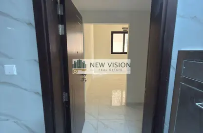 شقة - غرفة نوم - 2 حمامات للايجار في الزاهية - تجارية مويلح - الشارقة