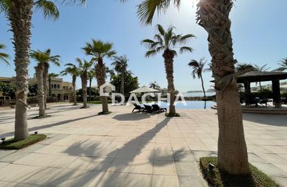 Villa - 3 - 4 for rent in Canal Cove Frond K - Canal Cove Villas - Palm Jumeirah - Dubai