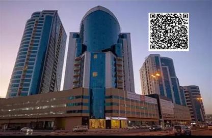 شقة - غرفة نوم - 2 حمامات للايجار في أورينت تاور 1 - أورينت تاور - البستان - عجمان