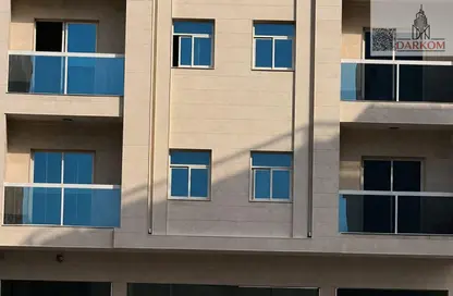 Whole Building for sale in Ajman Global City - Al Alia - Ajman